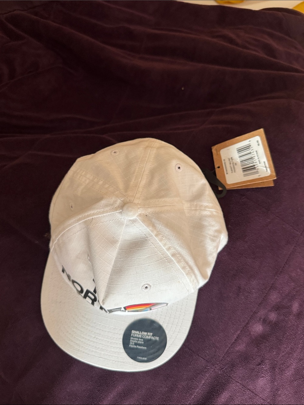 The North Face White Baseball Cap with Rainbow Logo Accent